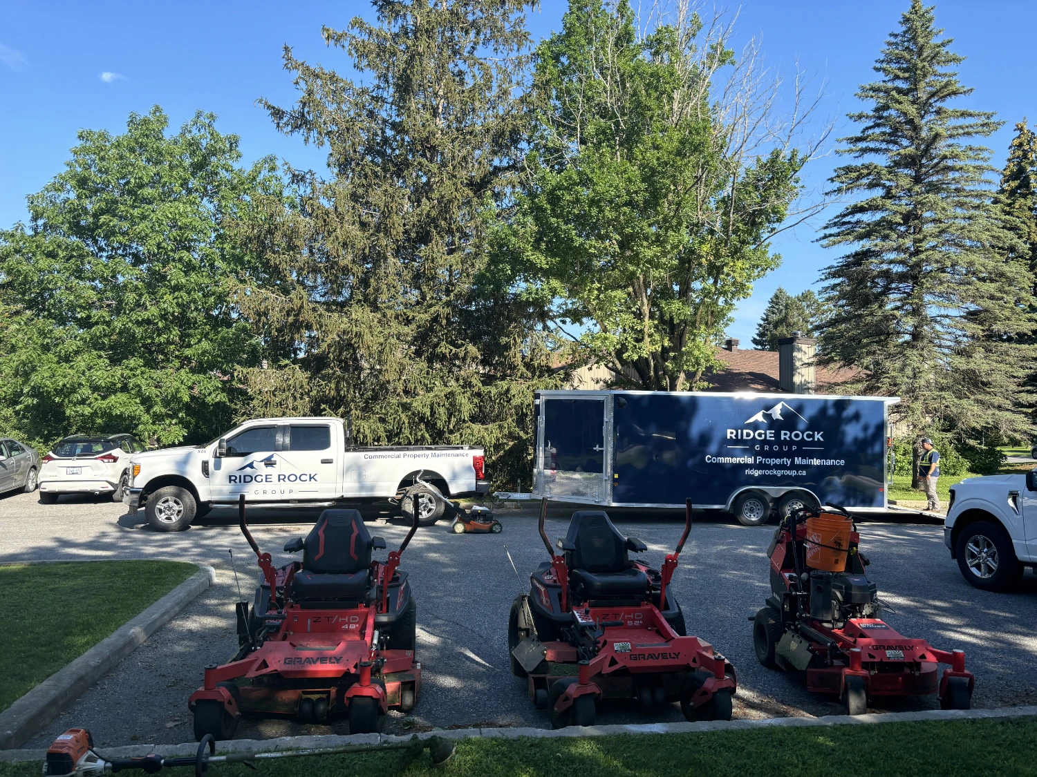 Ridge Rock Group truck, trailer, and mowers