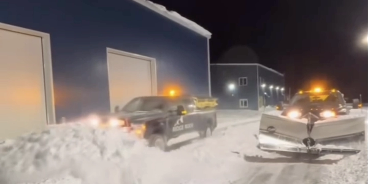Ridge Rock Group plow trucks responding to a storm at night