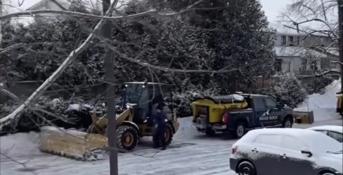 Ridge Rock Group loader and salt truck clearing snow